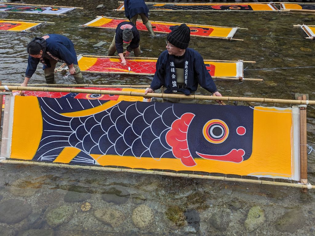 Koinobori soaking in the river in Gujo